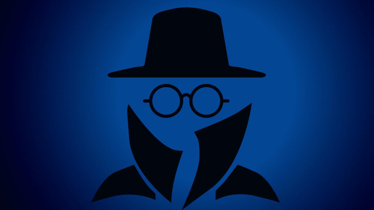 Силуэт шпиона в очках и шляпе